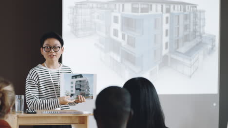 Asian-Woman-Giving-Presentation-on-Architecture-Conference